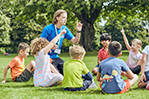 Staff leading outdoor play sessions