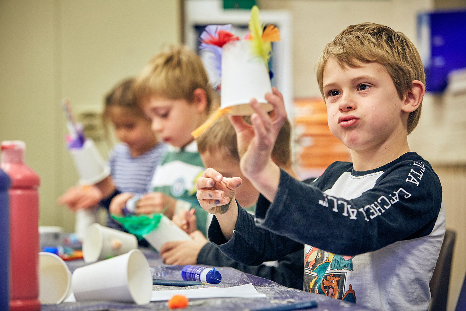 Boy playing with arts and crafts