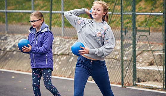 Outdoor Children Playing Dodgeball