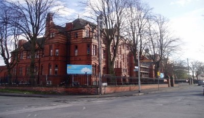 SuperCamps school holiday childcare at William Hulme's, front of school