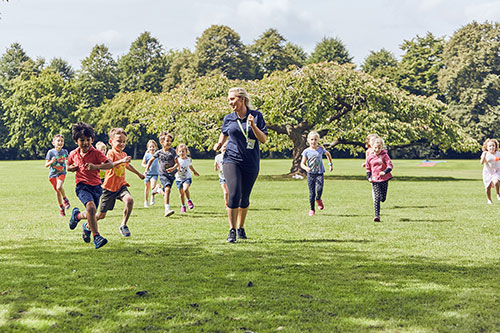 children having fun on field