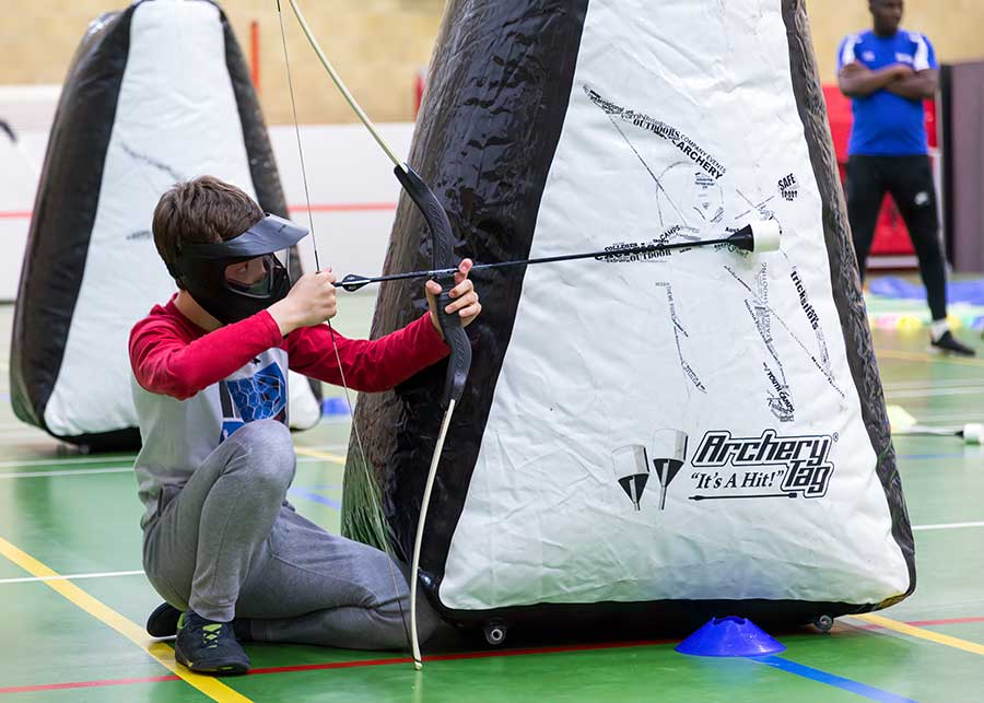 Boy playing Archery Tag at SuperCamps